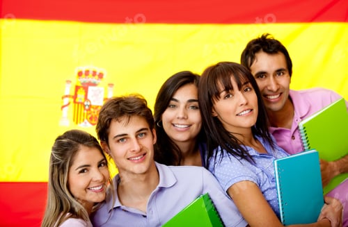 Preview: Spanish Students With The Flag Of Spain At The Background