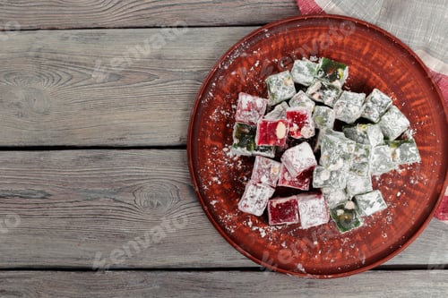Preview: Turkish delight on a wooden table.