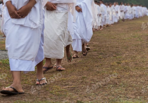 Preview: Closeup the foot of Many Buddhist nuns girls line in white suit walking