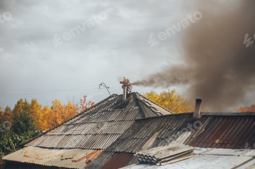 Preview: man clean chimney with the help of wacum