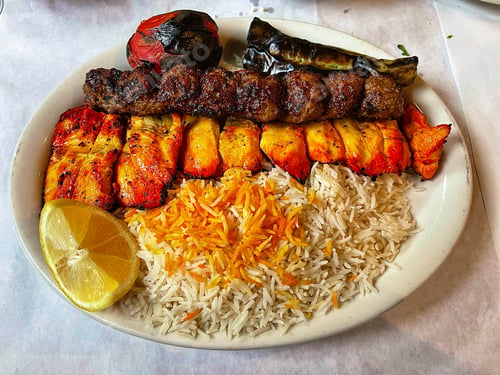 Preview: Grilled Kabobs with Rice and Lemon on Plate