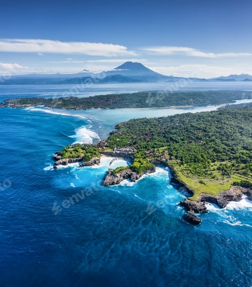 Preview: Aerial view at sea and rocks. Blue water background from top view. Summer seascape from air.