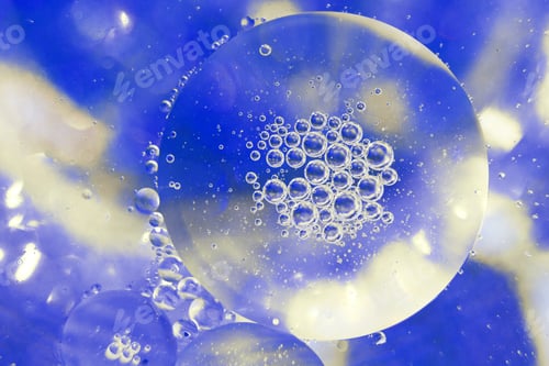 Preview: Oil bubbles close up. circles of water macro. abstract light blue background