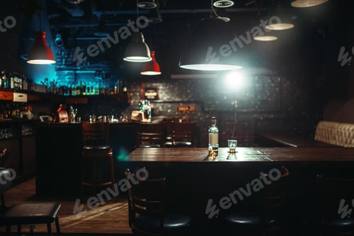 Preview: Pub, bottle of alcohol and glass on bar counter