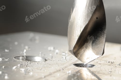 Preview: Close-up of drilling process and metal chips