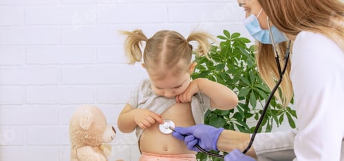 Preview: Female doctor examining little girl, listening to lungs with stethoscope. Pediatrician's appointment