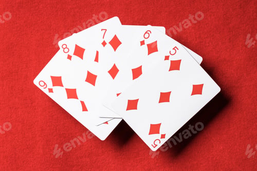 Preview: top view of red poker table and unfolded playing cards with diamonds suit