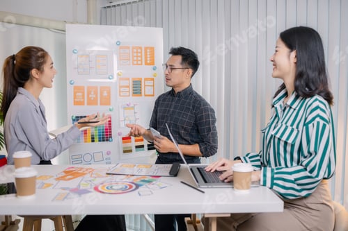 Preview: UX/UI designers collaborating during a creative workshop