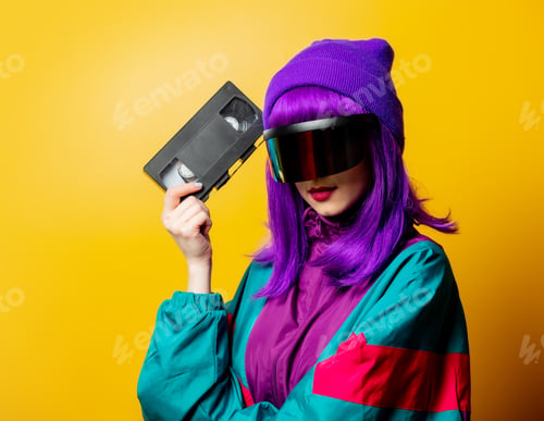 Preview: Style woman in VR glasses and 80s tracksuit with audio tape