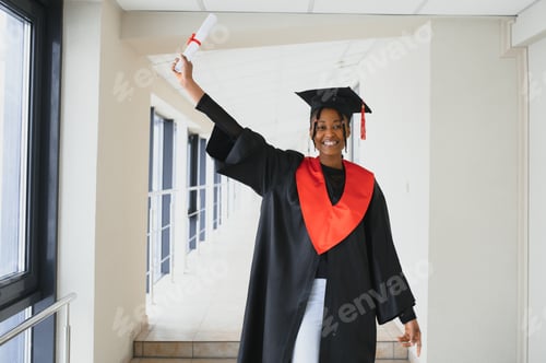 Preview: beautiful african female student with graduation certificate