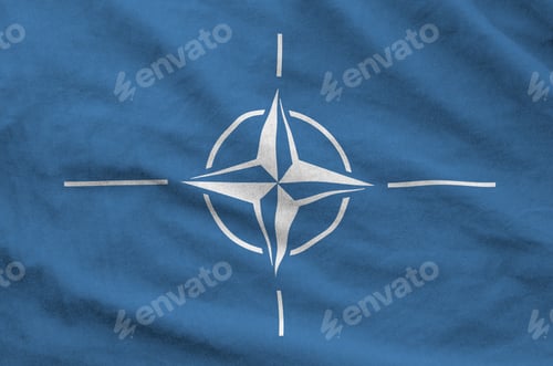 Preview: Nato flag depicted on folded wavy fabric of old cloth