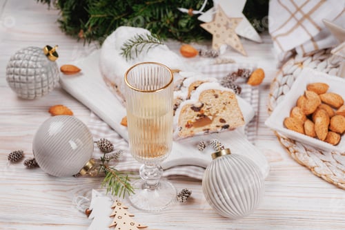 Preview: Holiday stollen bread with champagne and festive decor