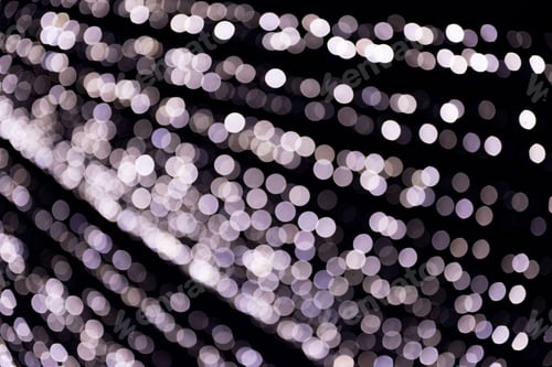 Preview: Abstract bokeh background, blurred, defocused bright glowing circles on dark pattern