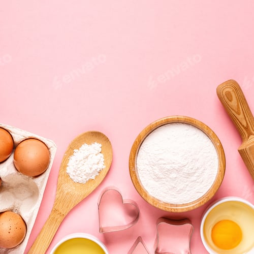 Preview: Ingredients and utensils for baking on a pastel background.