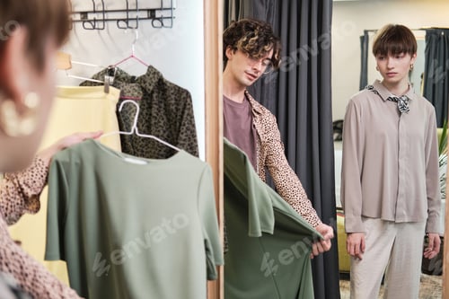 Preview: Woman choosing clothes with her stylist
