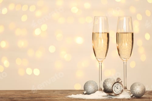 Preview: New year composition with champagne and space for text against blurred Christmas lights