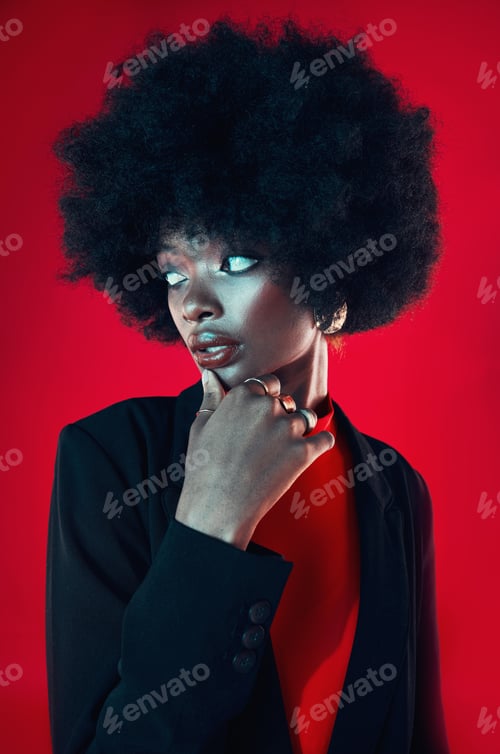 Preview: Black woman, confidence and afro, hair and beauty with shine isolated on red background. Hairstyle,