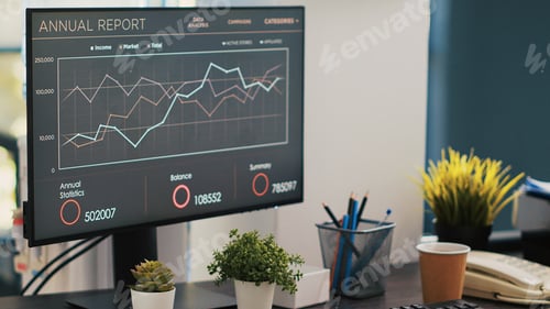 Preview: Economic annual revenue report on notebook in workspace with accessibility