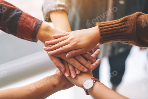 Preview: Top view image of businessman putting their hands together in the meeting