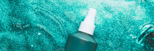 Preview: Transparent cosmetic bottle in water