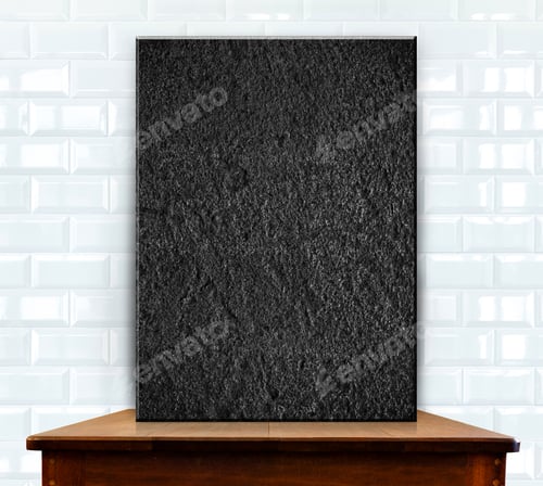 Preview: blank stone frame on wood table at white ceramic tiles wall