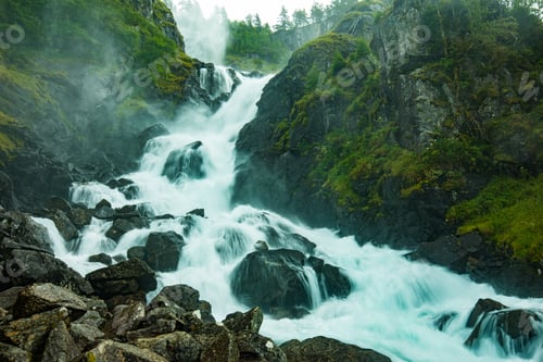 Preview: Latefossen waterfall in Hordaland, Norway. Old stone bridge.
