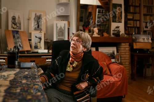 Preview: A gray-haired artist in her apartment