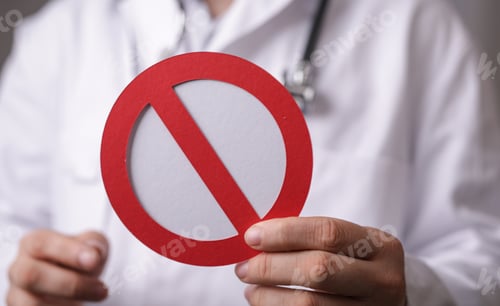 Preview: Red stop sign in the hands of a doctor