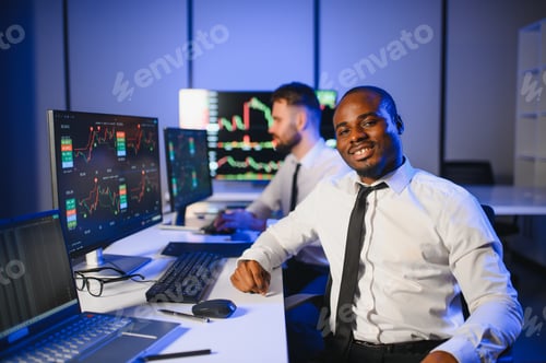 Preview: Conception of teamwork. Team of stockbrokers works in modern office with many display screens