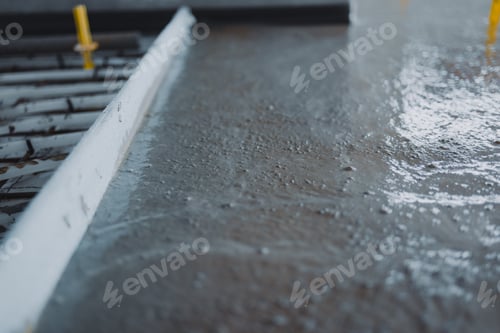 Preview: Workers pouring and finishing concrete surface flooring