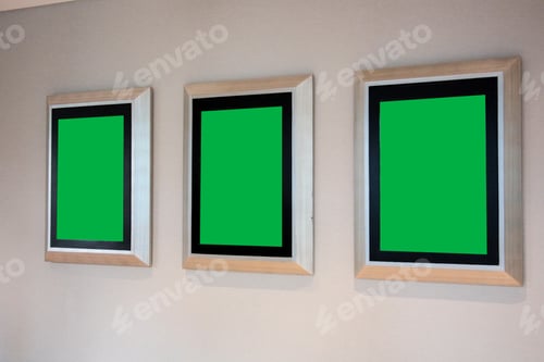 Preview: Row Of Three Blank Green Screen Frames Displayed On Simple Wall Providing Clean Mockup Space
