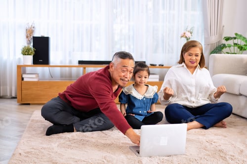 Vista previa: The family have fun relax engaged in fitness yoga at home using online instruction from laptop