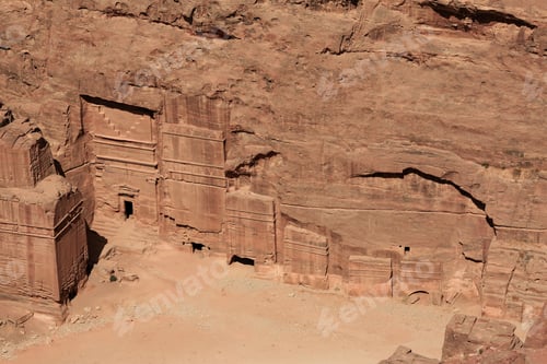 Preview: Exploring Petra ancient rock-cut architecture in Jordan during a sunny afternoon