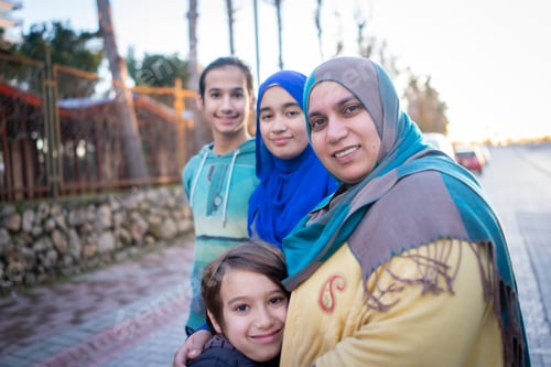 Preview: Real Muslim family on city street portrait