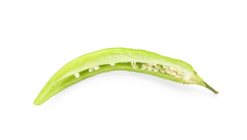 Preview: Slice of ripe chili pepper on white background, top view