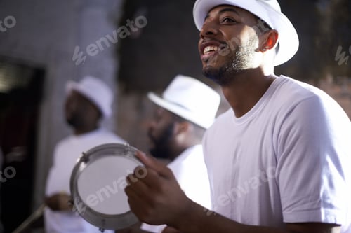 Preview: Shot of a band playing their percussion instruments in a Brazilian setting