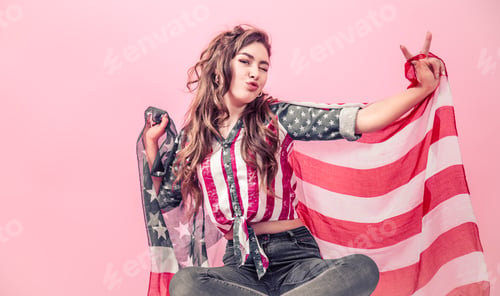 Preview: Patriotic girl with the flag of America on a colored background