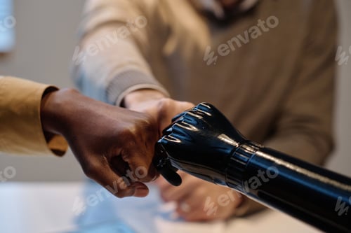 Preview: Diverse Group of Friends Giving Each Other Fist Bump