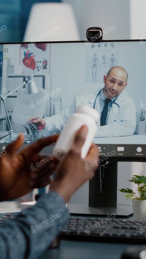 Preview: Black man at home seeking medical help from doctor