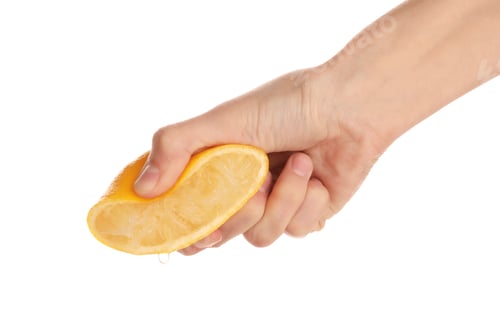 Preview: Woman squeezing fresh lemon juice isolated on white, closeup