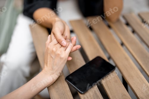 Preview: Lesbian couple holding hands together