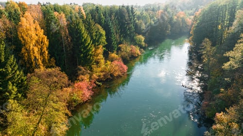 Preview: Sunrise at colorful forest and Broda river in Poland.