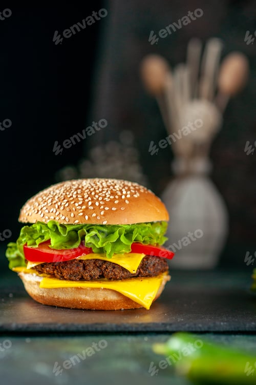 Preview: front view delicious meat hamburger with red tomatoes on dark background color fast-food kfc french