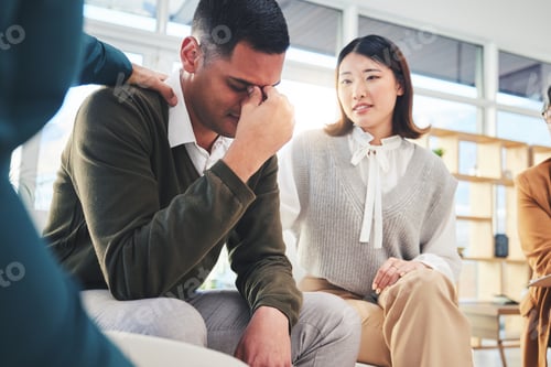 Preview: Group, support and psychologist comfort man in depression, anxiety or trauma stress in meeting. Cou