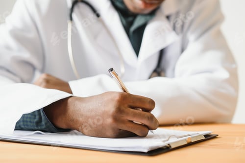 Preview: friendly african american doctor in modern office.