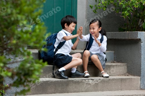 Preview: Two school children playing outside