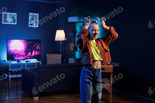Preview: Kid dancing inside neon lit home studio, creating content for online fans