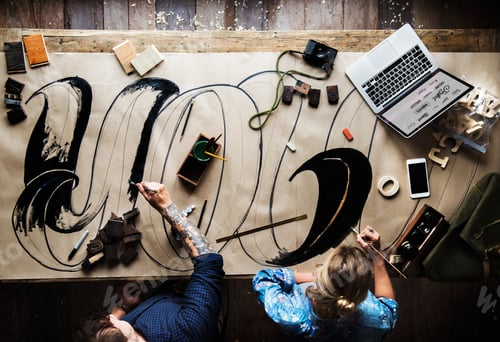 Preview: Aerial view of friends colleagues coloring artwork together
