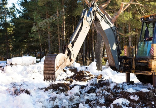 Preview: Bulldozer bucket close-up digs a pit for the construction