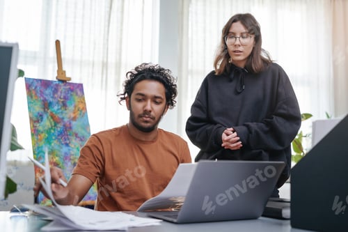 Preview: Team of two designers work together and planning their project